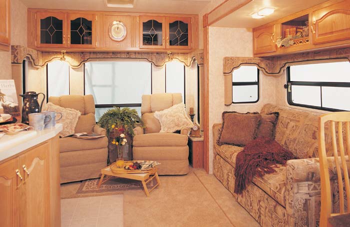 The 29.5 RLBG in Sand Decor. Deluxe Hide-a-Bed Sofa - Huge Overhead Cabinets - Optional Recliners in front of the Large Bay Window.
