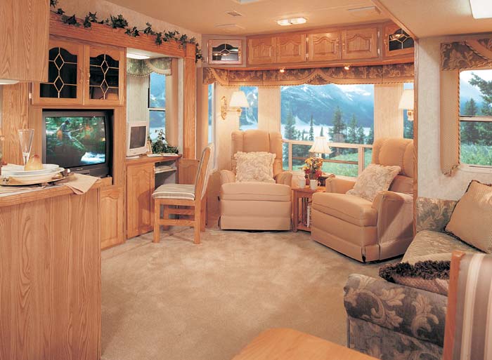 This beautiful 34+2 SK in Jade decore has comfortable gliders/recliners for a  residential feel and a bay window to bring the outdoors into your living room, when you find that special view.